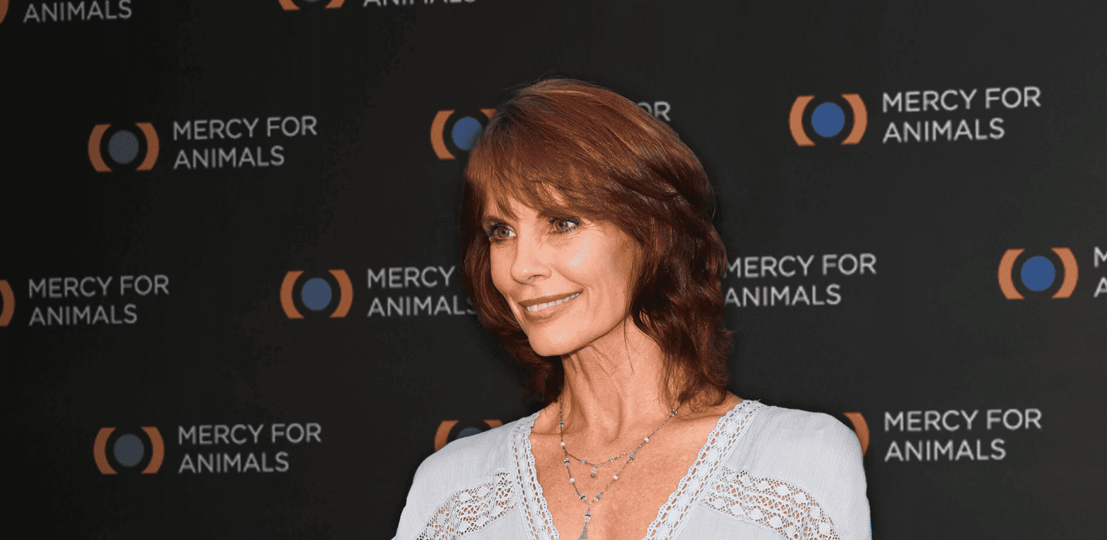 Photo of Baywatch star Alexandra Paul smiling at camera